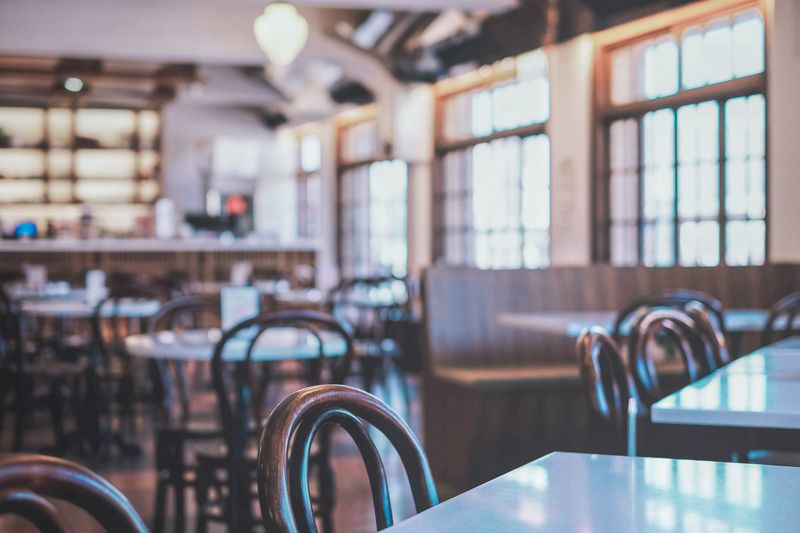 Pizza inn dining area with warm, welcoming atmosphere