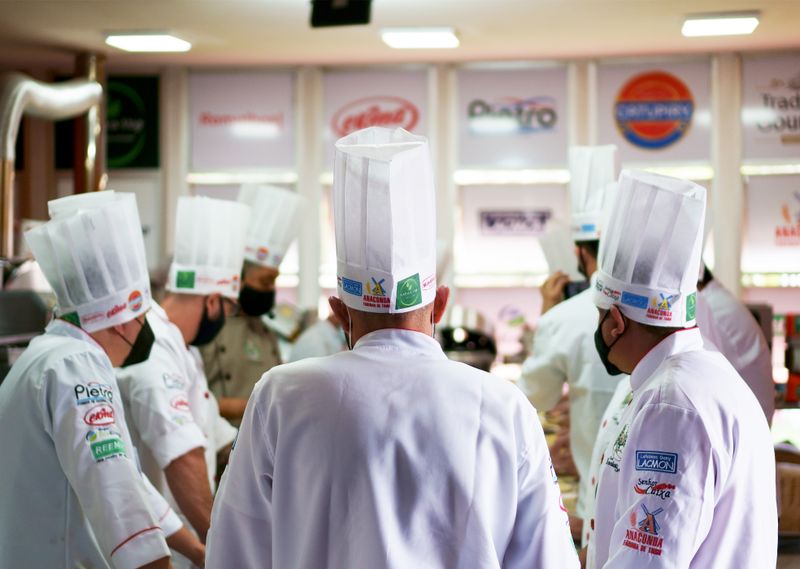 Pizza inn team members preparing fresh food in the kitchen
